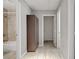 Hallway bathroom featuring neutral paint and updated tile floors at 1219 Heather Oaks Way, North Las Vegas, NV 89031