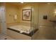 Relaxing bathroom with soaking tub and shower at 145 E Harmon Ave # 27621, Las Vegas, NV 89109