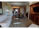 Cozy living room open to the kitchen with dining area at 145 E Harmon Ave # 27621, Las Vegas, NV 89109