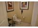 Neat powder room with white toilet at 145 E Harmon Ave # 27621, Las Vegas, NV 89109