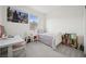Comfortable bedroom featuring a bed, a desk, and a charming mountain view at 1474 Whistling Kite St, Las Vegas, NV 89138