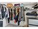 Walk-in closet featuring ample shelving and hanging storage for clothes and accessories at 1474 Whistling Kite St, Las Vegas, NV 89138