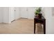 Bright foyer with wood-look flooring, a console table, and a welcoming atmosphere at 1474 Whistling Kite St, Las Vegas, NV 89138