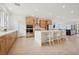 Open-concept kitchen featuring stainless steel appliances, granite countertops, and tile backsplash at 1474 Whistling Kite St, Las Vegas, NV 89138