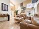 Spacious living room with tile flooring, high ceilings, and stylish decor at 1515 Fort Dix Cir, North Las Vegas, NV 89031