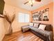 Inviting living area with sectional sofa, stylish decor, and bright window at 1515 Fort Dix Cir, North Las Vegas, NV 89031