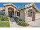 Close-up of a single-story house featuring desert landscaping and an inviting entrance at 1609 Hidden Spring Dr, Las Vegas, NV 89117