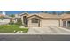 Charming single-story home with a well-maintained front yard at 1609 Hidden Spring Dr, Las Vegas, NV 89117