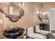 Striking powder room with unique sinks, lighting, and an ornate mirror at 1609 Hidden Spring Dr, Las Vegas, NV 89117