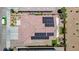 Overhead view of a single-Gathering home featuring solar panels, desert landscaping, and a backyard lawn at 1699 Sonoran Bluff Ave, Henderson, NV 89014