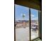 View from private balcony with patio furniture overlooking the surrounding landscape and houses at 1699 Sonoran Bluff Ave, Henderson, NV 89014