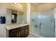Well-lit bathroom with vanity, glass shower, and neutral tones, offering a relaxing space at 1699 Sonoran Bluff Ave, Henderson, NV 89014