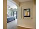 Primary bedroom doorway view showcasing soothing wall paint, carpet, and natural light from the windows at 1699 Sonoran Bluff Ave, Henderson, NV 89014