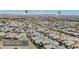 Aerial view of a residential area showing nearby destinations labeled in relation to the home's location at 1699 Sonoran Bluff Ave, Henderson, NV 89014