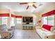 Bright and spacious living room with neutral tones and ample natural light at 1699 Sonoran Bluff Ave, Henderson, NV 89014