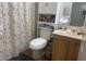 Well-lit bathroom featuring vanity with storage and shower with curtain at 2108 Willowbury Dr # B, Las Vegas, NV 89108