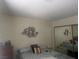 Cozy bedroom featuring a mirrored closet and neutral decor at 2108 Willowbury Dr # B, Las Vegas, NV 89108
