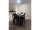 Cozy dining area featuring a wooden table with seating for four, perfect for intimate meals at 2108 Willowbury Dr # B, Las Vegas, NV 89108