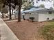 View of an exterior featuring a stucco wall and a tile roof at 2108 Willowbury Dr # B, Las Vegas, NV 89108