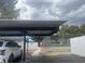 Assigned covered parking spot near tennis court and neighboring home for convenient access at 2108 Willowbury Dr # B, Las Vegas, NV 89108