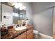 Bathroom with countertop, sink, mirror, and essentials at 2111 Bogart Ct, Las Vegas, NV 89117