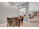 Dining nook featuring a table and chairs with an opening to the living room at 2111 Bogart Ct, Las Vegas, NV 89117