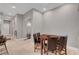 Cozy dining area with a table and chairs next to an arched doorway at 2111 Bogart Ct, Las Vegas, NV 89117