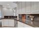 Close-up of kitchen countertops and sink area, showcasing modern fixtures and ample storage at 2111 Bogart Ct, Las Vegas, NV 89117