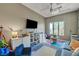 Play Room with a neutral color scheme, bright light and a plush couch and chair at 2111 Bogart Ct, Las Vegas, NV 89117
