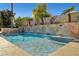 Gorgeous pool with a cascading waterfall feature and ample space for relaxation and entertaining at 2111 Bogart Ct, Las Vegas, NV 89117