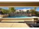 Inviting pool with water feature providing a serene outdoor retreat at 2111 Bogart Ct, Las Vegas, NV 89117