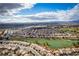 Panoramic aerial shot of a residential neighborhood featuring mature landscaping and golf course at 2708 Cheer Pheasant Ave, North Las Vegas, NV 89084