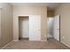 Bedroom featuring neutral walls, plush carpeting and closet at 2708 Cheer Pheasant Ave, North Las Vegas, NV 89084