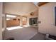 Covered patio featuring a ceiling fan, concrete flooring, and access to the home's interior through a sliding glass door at 2708 Cheer Pheasant Ave, North Las Vegas, NV 89084