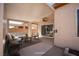 Inviting covered patio with comfortable seating and a ceiling fan at 2708 Cheer Pheasant Ave, North Las Vegas, NV 89084