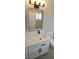 This bathroom features a modern vanity with stylish fixtures and ample storage space at 275 Las Palmaritas Dr, Las Vegas, NV 89110