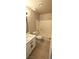Bathroom with white vanity, sink, toilet and combination shower and tub at 275 Las Palmaritas Dr, Las Vegas, NV 89110