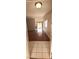 Open-concept entryway with tile and wood flooring that transitions to the living space at 275 Las Palmaritas Dr, Las Vegas, NV 89110