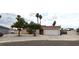 Charming single-story home with a two-car garage and low maintenance landscaping at 275 Las Palmaritas Dr, Las Vegas, NV 89110