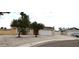 Cozy single-story home with two-car garage, ample driveway, and minimalist landscaping at 275 Las Palmaritas Dr, Las Vegas, NV 89110