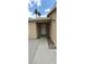 Inviting front porch with rock garden at 275 Las Palmaritas Dr, Las Vegas, NV 89110