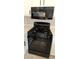 Close up of the modern black gas range and microwave oven at 275 Las Palmaritas Dr, Las Vegas, NV 89110