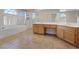 Beautiful primary bathroom featuring tile floors, dual sinks, bathtub and a separate glass enclosed shower at 2812 Via Avanti St, Henderson, NV 89074