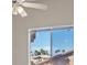 Bedroom featuring a ceiling fan and a sliding glass door with a view of the outdoors at 2812 Via Avanti St, Henderson, NV 89074