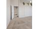 Neutral bedroom with a ceiling fan and carpet flooring, featuring a closet and connecting door at 2812 Via Avanti St, Henderson, NV 89074