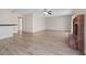 Open living area with laminate flooring, fireplace, and neutral paint, creating a welcoming atmosphere at 2812 Via Avanti St, Henderson, NV 89074