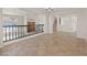 Open concept area featuring stairs, tile floors, and view of the living room at 2812 Via Avanti St, Henderson, NV 89074