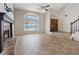 The living room has tile floors, a fireplace, arched windows, and high ceilings at 2812 Via Avanti St, Henderson, NV 89074