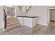 Wet bar with seating in the living area, convenient for entertaining, with easy access to stairs at 2812 Via Avanti St, Henderson, NV 89074