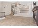 Living room view showing the high ceilings, staircase, and open floorplan at 2812 Via Avanti St, Henderson, NV 89074